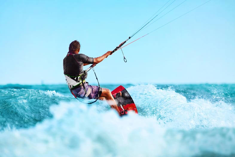 Person without a kiteboarding helmet