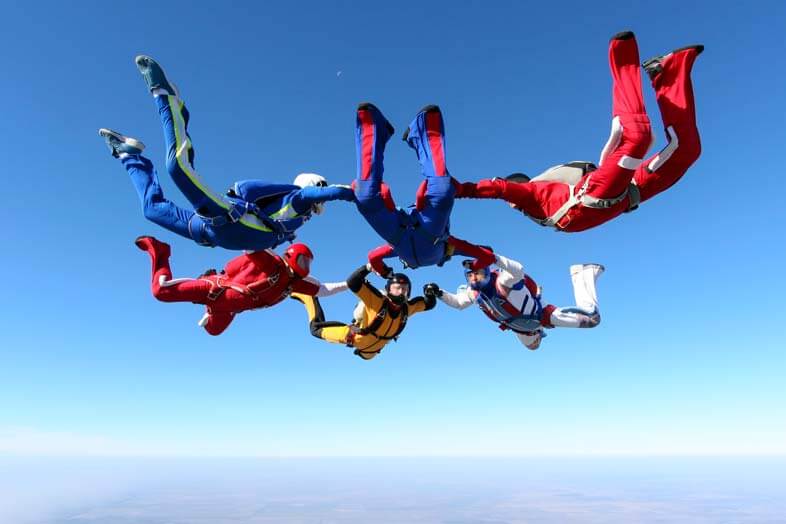 Skydiving group with skydiving helmet