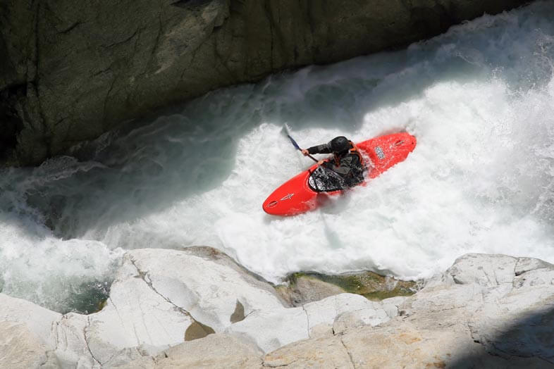 Canoeist with whitewater helmets